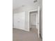 Spacious bedroom with carpet flooring, closet and neutral color palette at 4827 Lacewing Dr, Winter Garden, FL 34787