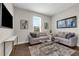 Comfortable living room offers modern decor, a large window, and a relaxing atmosphere at 4827 Lacewing Dr, Winter Garden, FL 34787