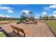 Fun playground with slides, swings, and benches for relaxation is available for Gathering enjoyment at 4827 Lacewing Dr, Winter Garden, FL 34787