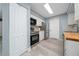 Bright kitchen showcasing stainless steel appliances, butcher block countertops, and a functional design with great storage at 5 Redwood Trace Run, Ocala, FL 34472