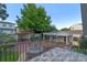 Scenic backyard view showcasing a fountain, patio area, pergola, and surrounding greenery at 525 Sheridan Blvd, Orlando, FL 32804