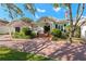 Beautiful home featuring a classic design, lush landscaping, and inviting front entrance at 525 Sheridan Blvd, Orlando, FL 32804