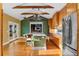 Eat-in kitchen with hardwood floors, granite countertops and stainless steel appliances at 525 Sheridan Blvd, Orlando, FL 32804
