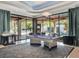 Game room with pool table, TV, and access to outdoor seating at 6137 Grosvenor Shore Dr, Windermere, FL 34786