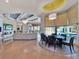 Open floor plan with living and dining spaces, and a view of the pool at 6137 Grosvenor Shore Dr, Windermere, FL 34786