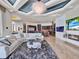 Spacious living room with modern fireplace and plenty of seating at 6137 Grosvenor Shore Dr, Windermere, FL 34786