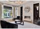 Stylish living room featuring a sleek fireplace, modern decor, and views of the pool at 6137 Grosvenor Shore Dr, Windermere, FL 34786
