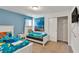 bedroom with two twin beds, bright blue accent wall, and 'Finding Nemo' decor at 8840 Bengal Ct, Kissimmee, FL 34747