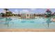 Stunning zero-entry community pool with lounge area and fun water features at 8840 Bengal Ct, Kissimmee, FL 34747