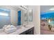Themed bathroom with dark vanity and colorful design elements, perfect for  at 9004 Sunshine Ridge Loop, Kissimmee, FL 34747