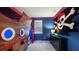 Themed bedroom with a pirate ship bed frame and skull and crossbones wall decal at 9004 Sunshine Ridge Loop, Kissimmee, FL 34747