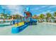The splash pad area offers a colorful water play structure for entertainment at 9004 Sunshine Ridge Loop, Kissimmee, FL 34747