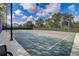 Outdoor basketball court featuring well-maintained surface and fencing at 8639 Lower Villagewalk Cir, Orlando, FL 32827