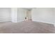 Inviting bedroom featuring neutral decor and an en-suite bathroom for added convenience at 8639 Lower Villagewalk Cir, Orlando, FL 32827