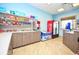 Convenient snack shop with shelves stocked with treats, a beverage cooler, and a tidy counter area at 9081 Hazard St, Davenport, FL 33896