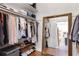 Walk-in closet with mirror and shelving at 1 W Village Dr, Oviedo, FL 32765