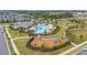 A scenic view shows the pool and playground amenities available to residents within the community at 10684 Words Dr, Winter Garden, FL 34787