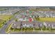 A bird's-eye view captures the community's layout, homes, and beautifully landscaped surroundings at 10684 Words Dr, Winter Garden, FL 34787