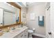 Cozy bathroom with a neutral palette, vanity, sink, mirror, and toilet at 1210 Baypoint Ct, Longwood, FL 32750