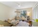 Cozy bedroom with a teddy bear, chair, bookcase, rug, and a twin sized bed at 1210 Baypoint Ct, Longwood, FL 32750