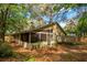 The house is screened-in and surrounded by a fence, offering plenty of privacy at 1210 Baypoint Ct, Longwood, FL 32750