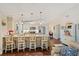Bright, updated kitchen with granite countertops, modern appliances, and a breakfast bar at 1210 Baypoint Ct, Longwood, FL 32750