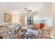 Comfortable living room with plenty of natural light, neutral tones, and contemporary furniture at 1210 Baypoint Ct, Longwood, FL 32750