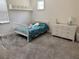 bedroom with a bed, dresser, and ample carpet space for playing at 12238 Still Meadow Dr, Clermont, FL 34711