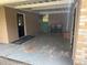 Carport featuring two doors and storage at 1528 Baltimore Dr, Orlando, FL 32810