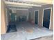 Covered parking area with 3 doors at 1528 Baltimore Dr, Orlando, FL 32810