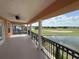 A balcony with view of water and golf course at 1554 Corolla Ct, Reunion, FL 34747