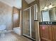 A full bathroom with a shower, tub, toilet and vanity at 1554 Corolla Ct, Reunion, FL 34747