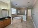 Bright bathroom featuring a soaking tub, walk-in shower, and vanity at 1554 Corolla Ct, Reunion, FL 34747