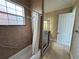 A full bathroom featuring a shower and tub at 1554 Corolla Ct, Reunion, FL 34747