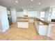 Well-equipped kitchen featuring granite countertops, stainless steel appliances, and ample cabinet space at 1554 Corolla Ct, Reunion, FL 34747