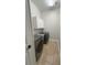 Laundry room featuring a washer, dryer, and utility sink at 1554 Corolla Ct, Reunion, FL 34747