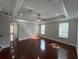 Bright living room with hardwood floors and abundant natural light at 1554 Corolla Ct, Reunion, FL 34747
