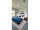 Comfortable bedroom with a large bed, soft carpet, and a scenic outdoor view at 16358 Sw 27Th Terrace Rd, Ocala, FL 34473