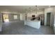 Well-lit, open-concept kitchen with a large island, modern appliances, and ample space at 16358 Sw 27Th Terrace Rd, Ocala, FL 34473