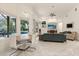 A bright living room with tile flooring, stylish furniture, and backyard pool view at 205 Torcaso Ct, Winter Springs, FL 32708