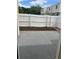 Enclosed backyard with a white fence surrounding the property and small mulched flower bed at 247 Debora Ct # 1, Altamonte Springs, FL 32701