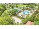 Aerial view featuring a pool, tennis courts, basketball court, sand volleyball and other community recreation facilities at 2724 Westyn Cove Ln, Ocoee, FL 34761