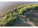 Aerial view showcasing a dock on the water, trees, and walkways at 2724 Westyn Cove Ln, Ocoee, FL 34761