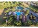 Aerial view of community amenities including a pool, tennis courts, basketball court and clubhouse at 2724 Westyn Cove Ln, Ocoee, FL 34761