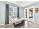 Bright dining area with a large window, a glass-paneled door, and durable tile floors at 2724 Westyn Cove Ln, Ocoee, FL 34761