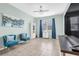 Living room featuring comfortable seating and a large window at 2724 Westyn Cove Ln, Ocoee, FL 34761