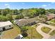 An aerial view of a home with a well maintained front lawn and landscaping at 2906 E Grant Ave, Orlando, FL 32806