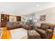 Comfortable living room with built-in shelves, large sectional couch, and natural light at 2906 E Grant Ave, Orlando, FL 32806