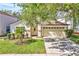 Inviting single-Gathering home boasts a manicured lawn, well-maintained landscaping, and a charming front entrance at 300 Augustine Ct, Oviedo, FL 32765