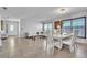Bright living and dining area featuring tile flooring and ample natural light at 300 Augustine Ct, Oviedo, FL 32765